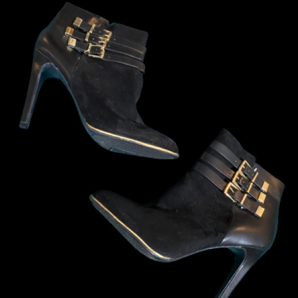 Gold accent ankle booties.